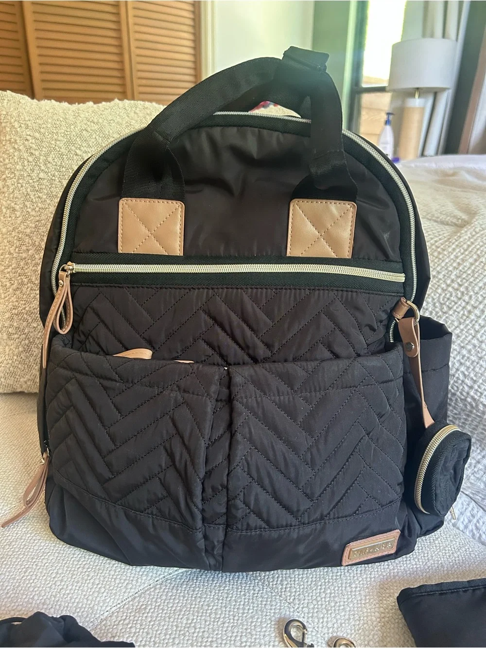 Skip Hop 6 in 1 Black Quilted Diaper Backpack with Tan Trim and Accessories
